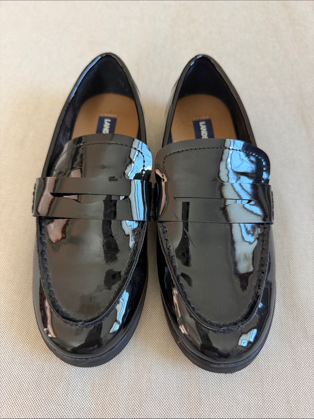 Girl’s Land’s End black patent leather penny loafers, size 2.